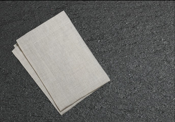 Kitchen cloth on slate texture background,food advertisement backdrop.