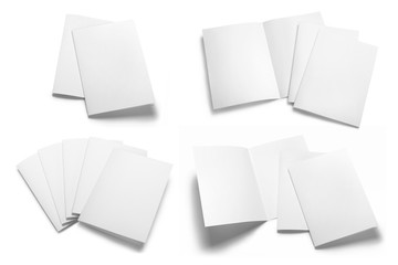Collection of folded sheets of white paper, isolated on white background