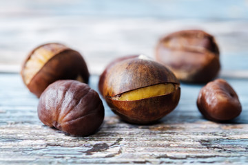 Chestnuts peeled and peeled in a white bowl
