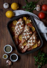 sea ​​bass with lemon tomatoes and aromatic herbs