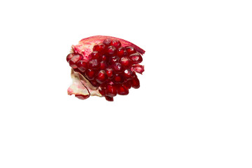 Slice ripe pomegranate isolate white background