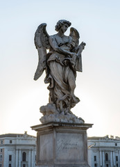 Obraz premium Full size statue of Angel with the Whips on Ponte Sant'Angelo in Rome near Castel Sant'Angelo