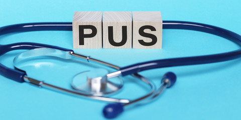 Pus is a word made of wooden blocks. Medical concept