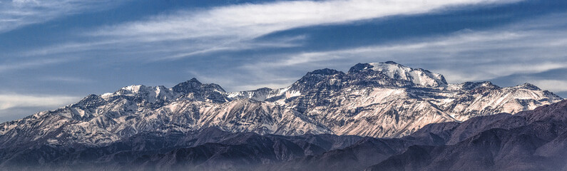 beautiful panoramic of the los andes mountains and clouds in the sky (Santiago, Chile)