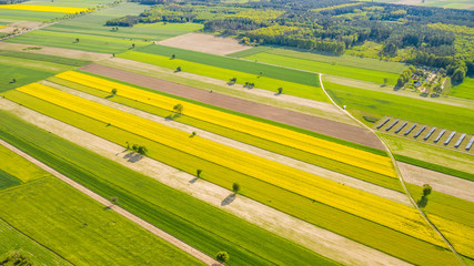 farmlands in the afternoon light from a drone © Krzysztof