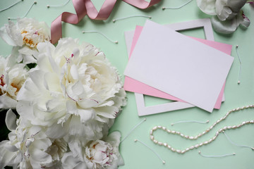 Obraz na płótnie Canvas postcard mockup. romantic composition of pink peonies