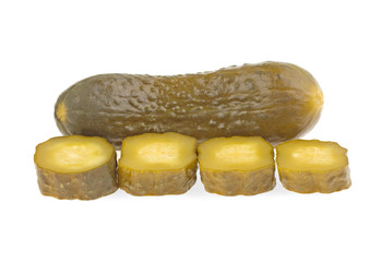 Fresh sliced green pickles isolated over white background