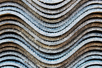 Photo of a folded wavy slate. Construction material.