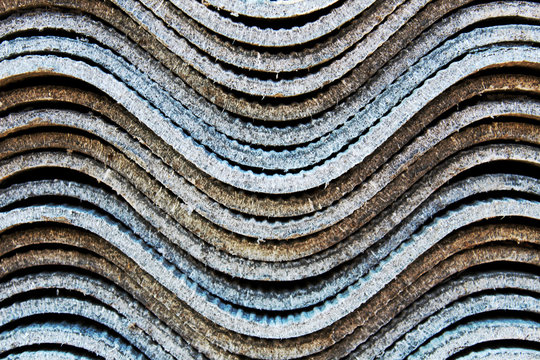 Photo of a folded wavy slate. Construction material.
