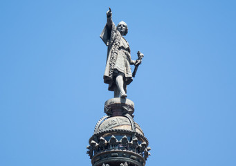 Columbus Monument at the end of La Rambla street near the port in Barcelona. Close up statue of Columbus who point straight in front of him.