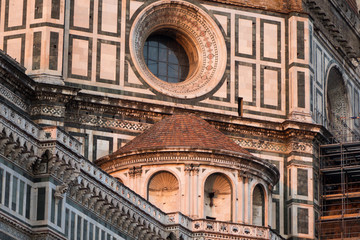 Fototapeta premium Exterior / facade of the Cathedral of Santa Maria del Fiore in Florence, Italy. Closer look onto a part of the dome with round window