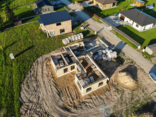 House under construction in construction site