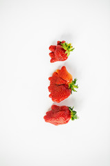 Three ugly strawberries with place for text