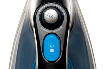Buttons and controls of the new iron isolated on a white background close-up