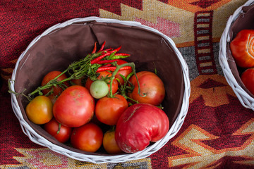Red ripe tasty fresh delicious tomato vegetables in bazaar market