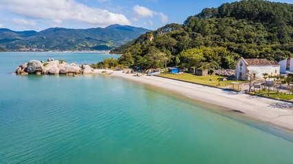 Aerial view of Arma&ccedil;&atilde;o da Piedade beach (Praia da Arma&ccedil;&atilde;o da Piedade) - Governador Celso Ramos. Historical and beatiful beach in Santa Catarina, Brazil