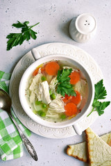 Chicken soup with vegetable. Top view with copy space.