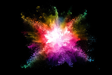 abstract colored dust explosion on a black background.abstract powder splatted background,Freeze...