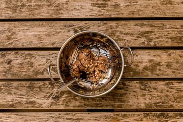 Fototapeta na wymiar Chocolate ice cream in a silver bowl