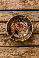 Chocolate ice cream in a silver bowl