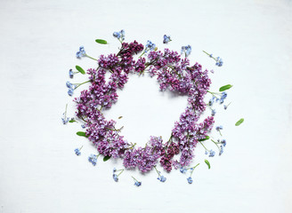 frame from lilacs and forget me  not,for greeting cards,invitations ,with space for text
