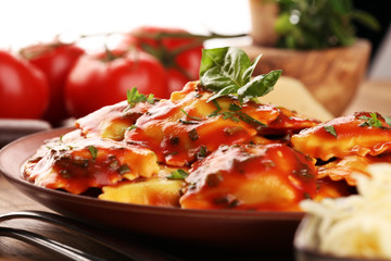 Ravioli with tomato sauce and basil. Fresh homemade ravioli