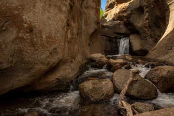Hidden Falls waterfall on McGee Creek in natural rock canyon in the Buttermilks of Eastern Sierra...