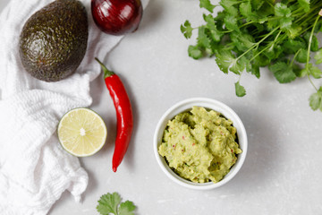 Mexican sauce guacamole with ingredients