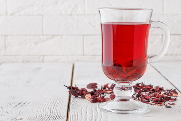 aromatic Hibiscus tea on white table