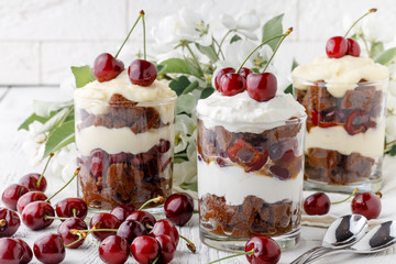 Trifle dessert made with fruit, a thin layer of sponge fingers soaked in sherry with chocolate, coffee or vanilla.