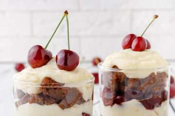 Delicius trifle with cherry and cream for breakfast