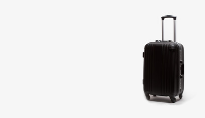 One black stylish suitcases. Place for text
