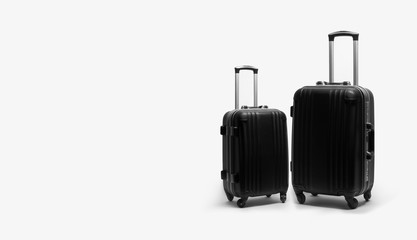 Two black stylish suitcases. Place for text