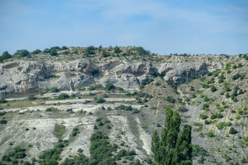 Limestone cliffs with sample of material, limestone erosion in the rocks.