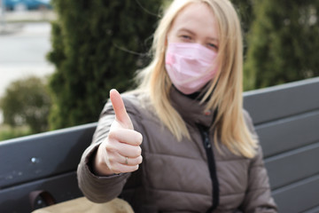 masked woman outdoors coronavirus disease safety