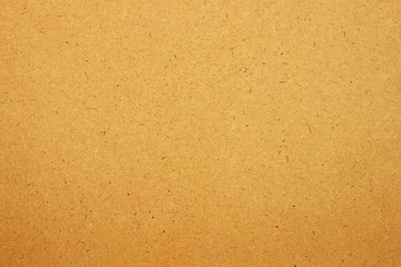 Sheet of brown paper or cardboard texture  background.