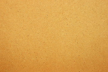 Sheet of brown paper or cardboard texture  background.