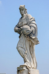 Fototapeta na wymiar Marble statue of Pietro d'Abano in Prato della Valle in Padua, Italy.