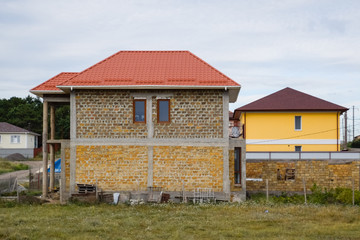 Fototapeta na wymiar limestone houses. Building material is limestone.