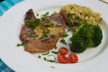 PORK CHOPS AND BOILED VEGETABLES