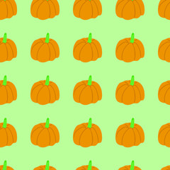 Pumpkins on a green background seamless pattern.