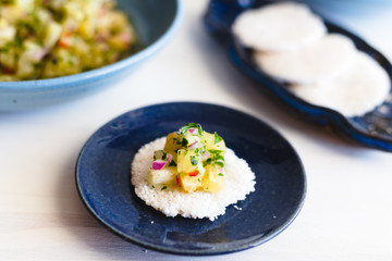Ceviche with Tapioca on a blue and white background