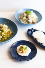 Ceviche with Tapioca on a blue and white background