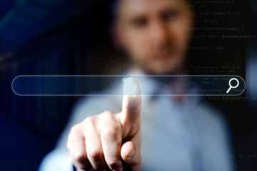 Searching Browsing Concept. man with index finger clicks on search bar