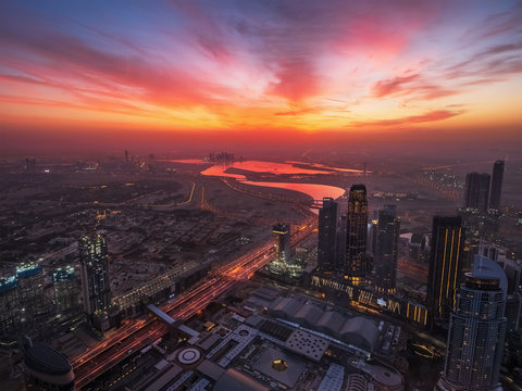 Dubai skyline at sunrise. United Arab Emirates landscape, modern city from above. © DedMityay