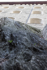 profile of a medieval fort seen from a spur of rock