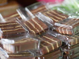Indonesian traditional cake sell in market. Kanji layer cake slice. This's type of wet cake. Starch cake is quite often found in traditional market.