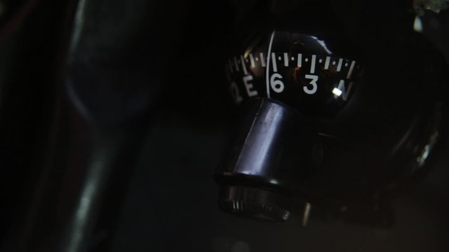 An Old Aircraft Compass inside a Bomber Plane. Close-Up.