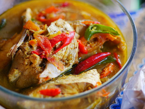 Indonesian traditional culinary /dish from fish called "Asem-asem Arut". It's arut fish (Pomadasys hasta) soup with hot spicy and sour flavour in a glass bowl. Traditional fish soup from Tarakan.