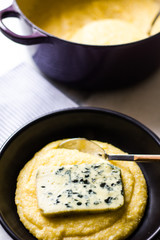 Polenta with blue cheese and black ceramic